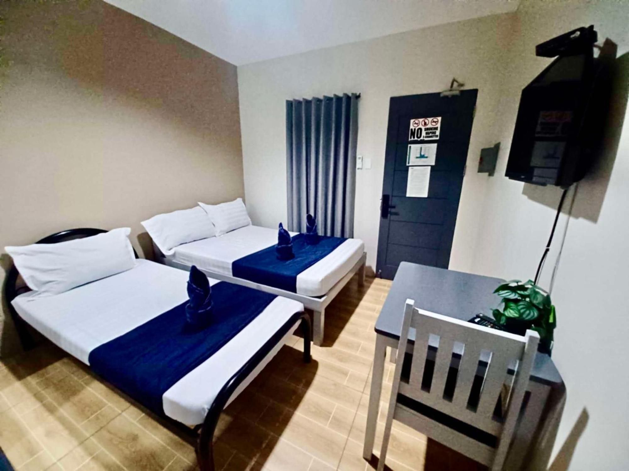 2020 Travelers Inn Dumaguete City Eksteriør billede